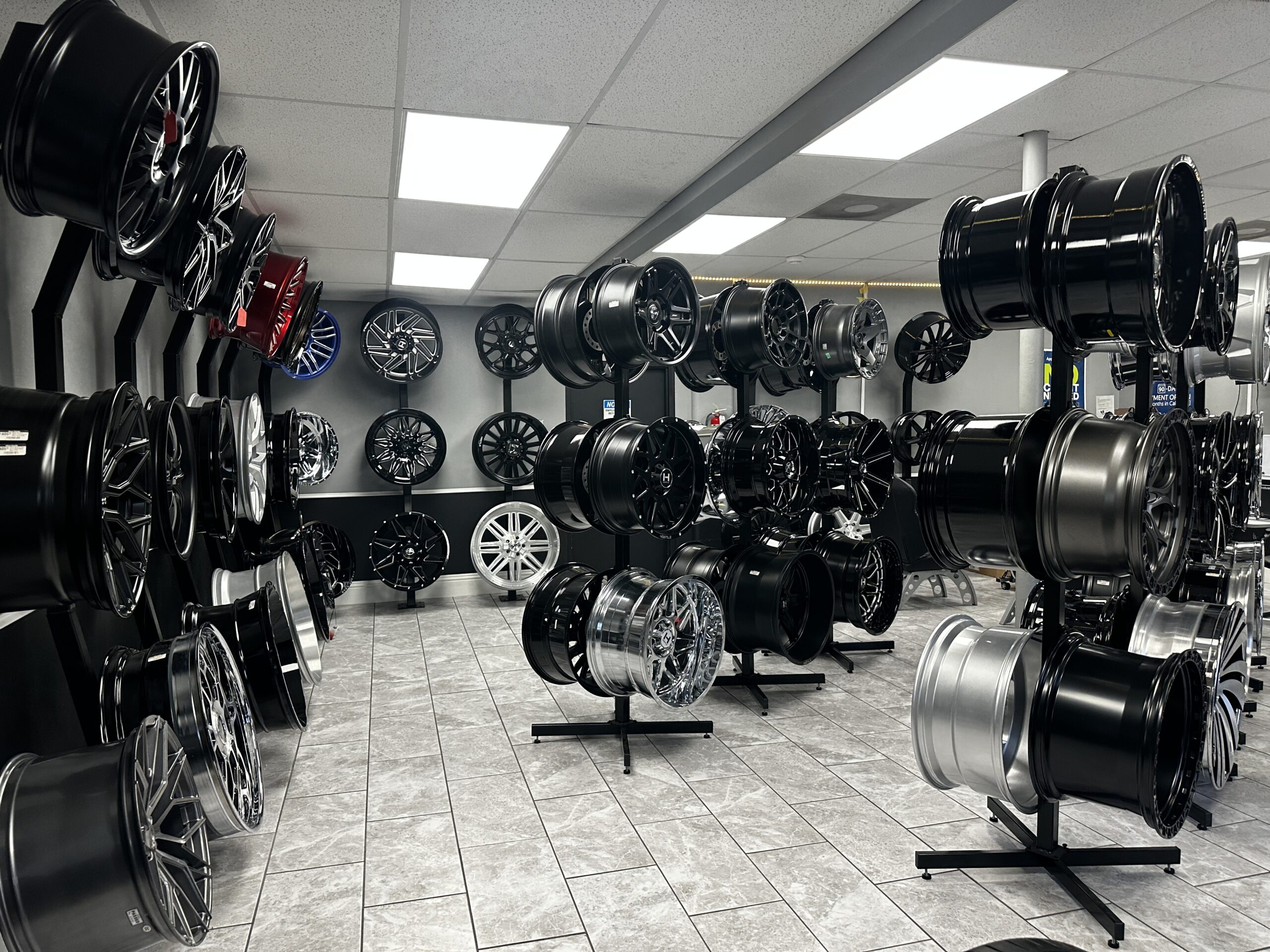 The Wheel Identity showroom, showcasing dozens of wheels and rims that are all available for financing through our partners.